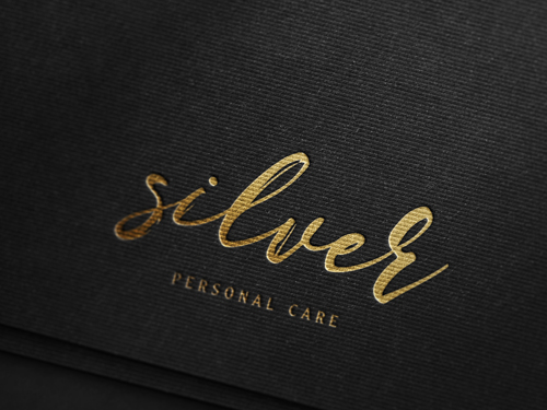 PSD luxury gold foil debossed logo mockup on textured black paper